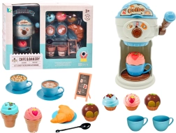 Süße Leckereien des Kaffeekonsums mit Eismaschine, Tassen und Muffins