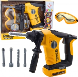 Gelber Bohrhammer für Kinder mit austauschbaren Endstücken und Schutzbrille