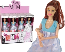 Schwangere Puppe im blauen Kleid mit Baby