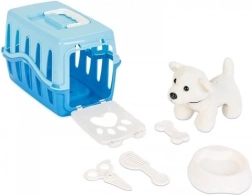 Hündchen in blauem Transportkasten