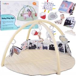 Pädagogische Spieldecke mit Bögen und Hängespielzeug