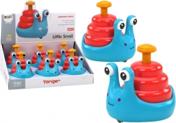 Glückliche rollende Schnecke auf einem blauen und roten Pferd