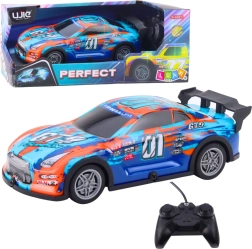 RC Rennwagen mit leuchtender Karosserie, orange‑türkis