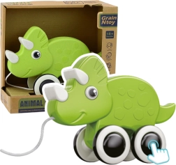 Grüner Ziehdinosaurier mit Pfeife