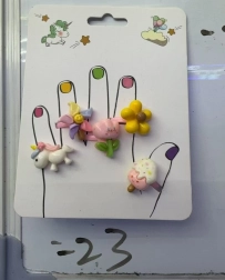 Ringe mit Blumen- und Einhornmotiven