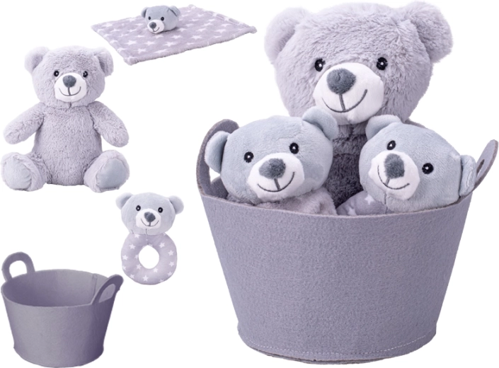 Geschenkset für Neugeborene mit Plüschbär, Rassel und Schmusetuch im Korb