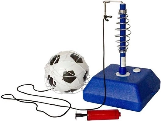 Kinder-Fußballtrainer mit Ball