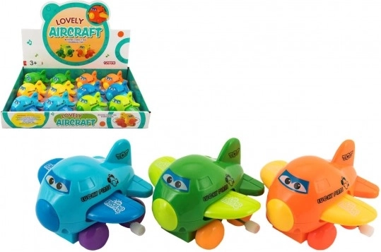 Aufzieh-Flugzeug mit Augen – flatternde Flügel, Kunststoff 8 cm, Farbmix