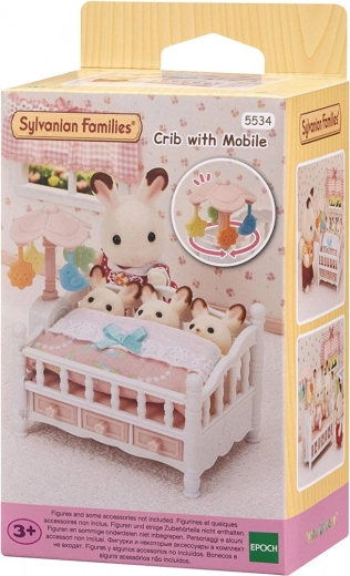 Puppenbett mit Mobile und Zubehör