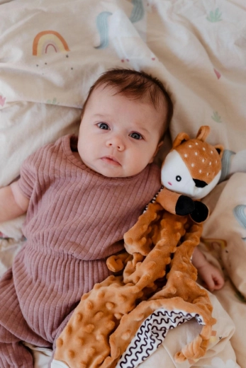 Zarte Rassel für die sensorische Entwicklung