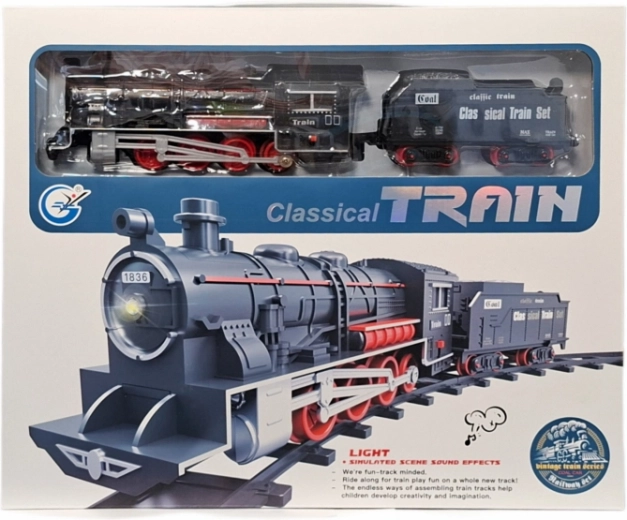 Klassische batteriebetriebene Eisenbahn mit Dampflok und Waggon
