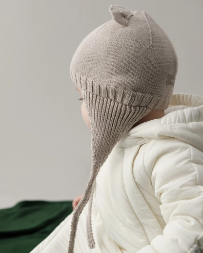 Öhrchen und Ohrenklappen gegen Wind