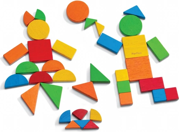 Kreatives Legen von Mosaiken aus farbigen Formen