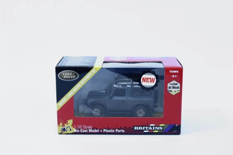 Modell-Geländewagen TOMY Britains Land Rover Defender 90 im Schlamm 1:32