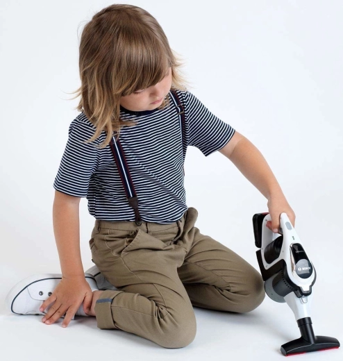 Öffnbarer Behälter und rotierende Kügelchen