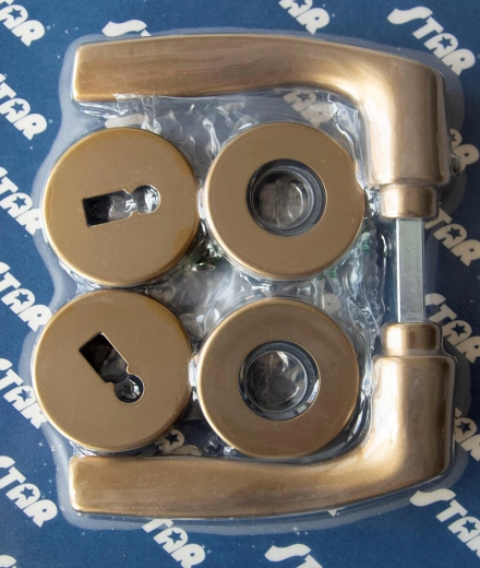 Türbeschlag MONET mit Rosette F4, Schlüssel, bronzefarben eloxiert