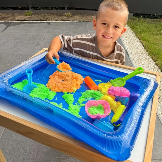 Aufblasbarer Sandkasten für saubereres Spielen