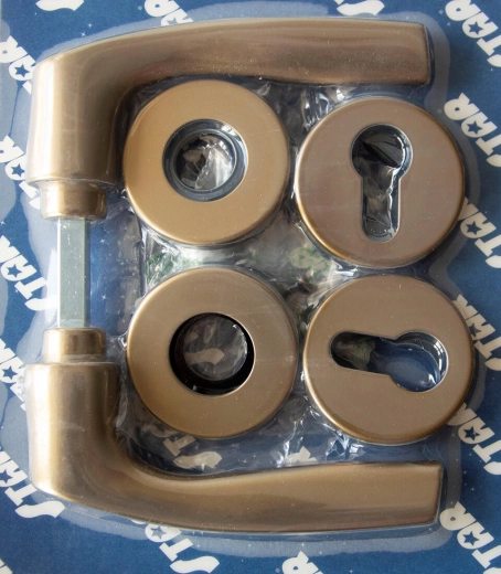 Türbeschlag MONET auf Rosette, Zylindereinsatz, bronze eloxiert