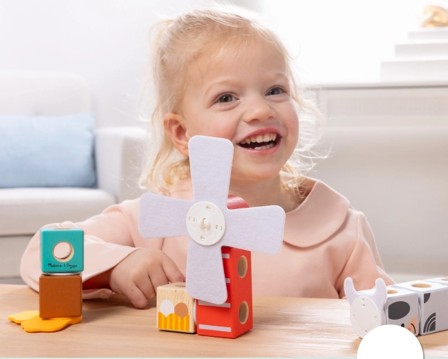 Interaktives Windrad und spielerische Bauernhofmotive