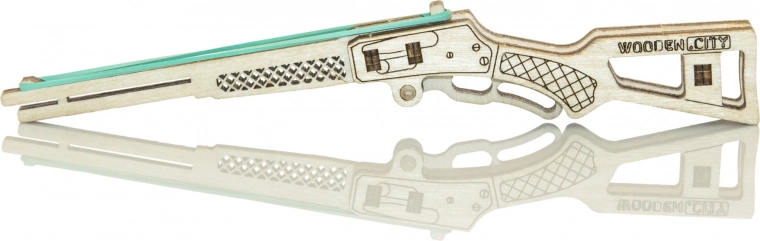 Drei hölzerne Pistolenmodelle