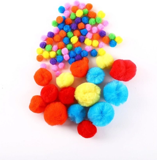Bunte Pompons und Wackelaugen für Charakter und Details