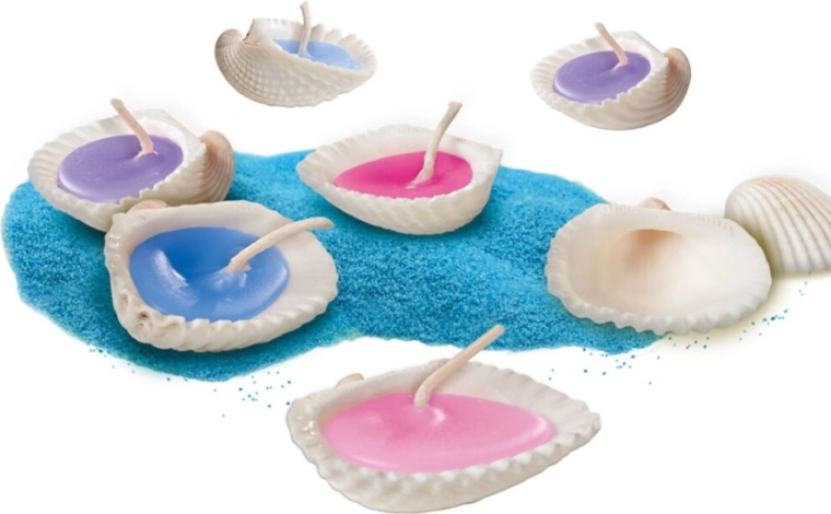 Kerzen in echten Muscheln