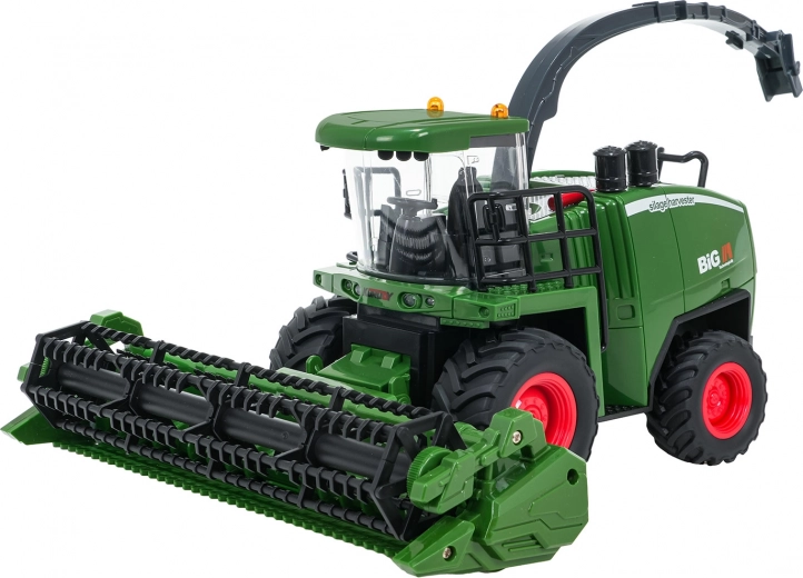 Funktionierende Schneidtrommel und drehbarer Ausleger