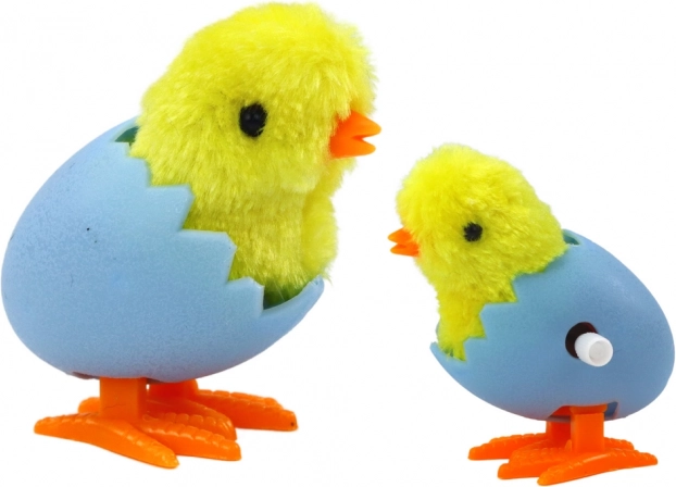 Aufziehbares Küken in gelber Schale