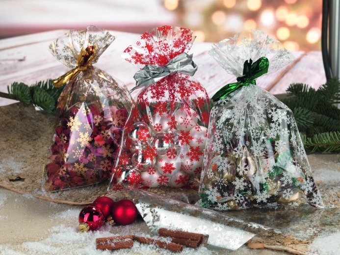 Zellophanbeutel 20 × 32 cm mit Schneeflockenmotiv, transparent