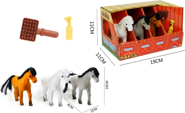 Drei Ponys im Stall mit Zubehör
