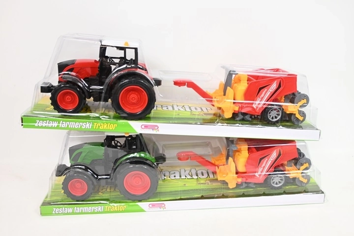 Kindertraktor mit Landwirtschaftsgerät