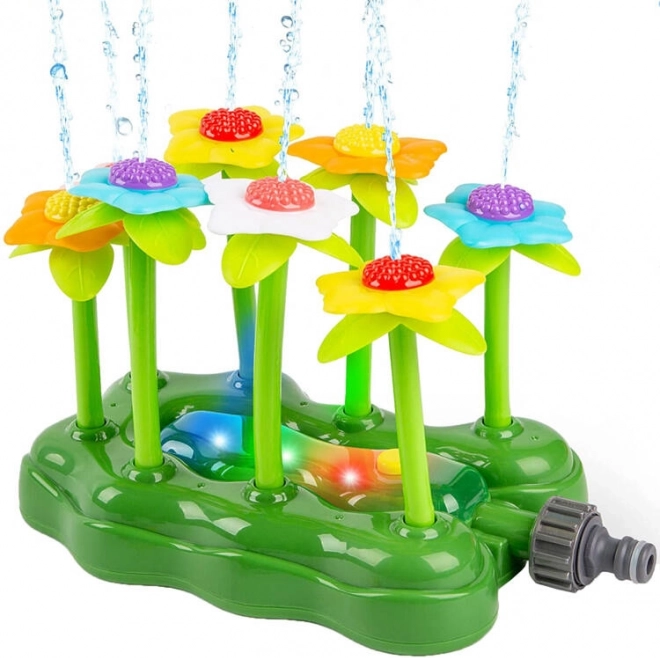 Gartensprinkler mit beleuchteten Blumen – Wasserfontäne für Kinder