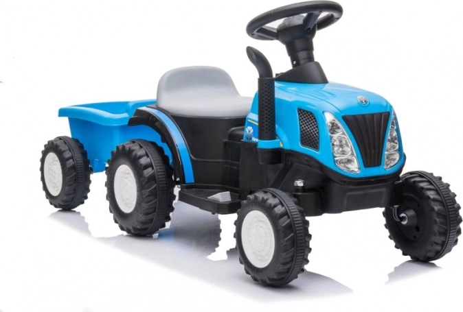 Blauer Kindertraktor mit Batterieantrieb und Anhänger