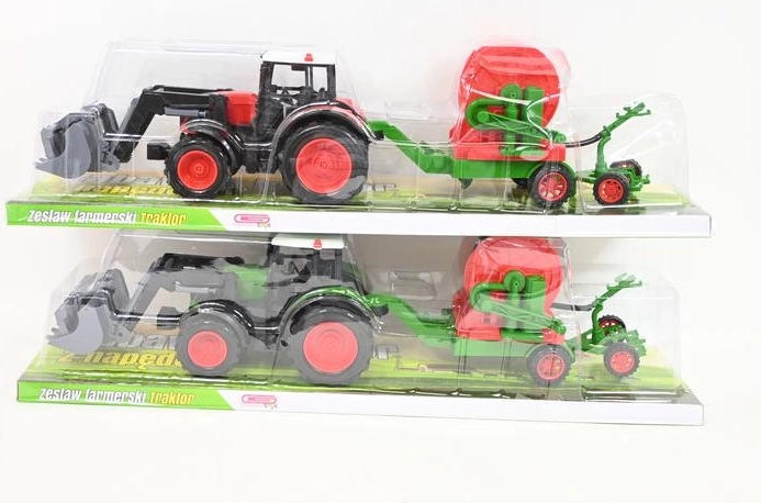 Kindertraktor mit landwirtschaftlichem Anbaugerät