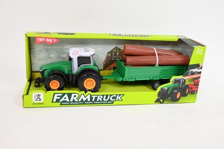 Traktor mit Anhänger und Baumstämmen