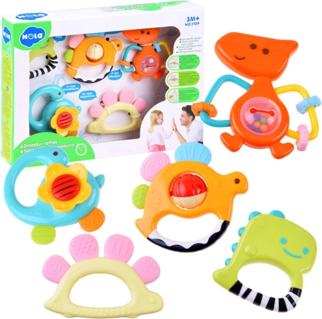 Set aus 5 Rasseln und Beißringen Dinosaurier