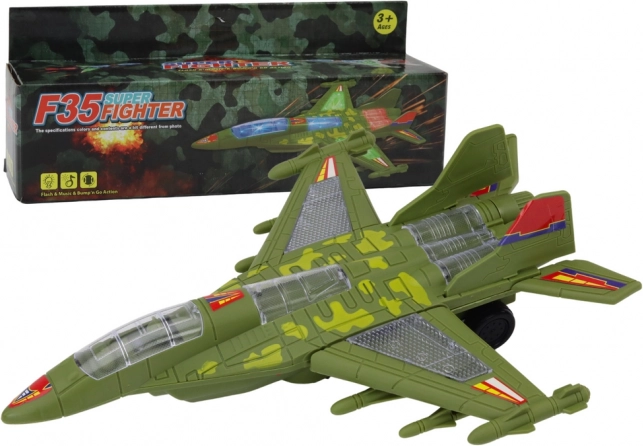 Militärischer Düsenjäger mit Licht und Sound – grün
