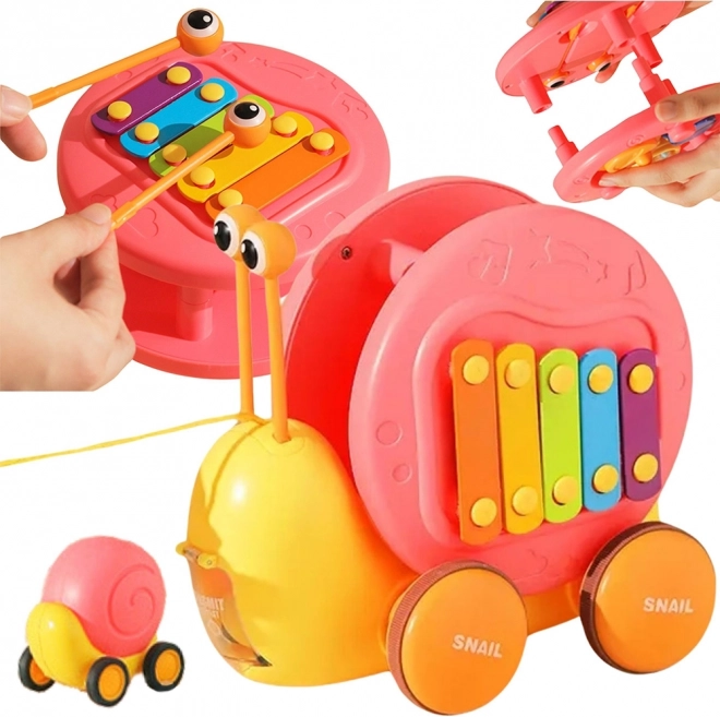 Multifunktionales WOOPIE Spielzeug Schnecke mit Xylophon und Autoabschuss