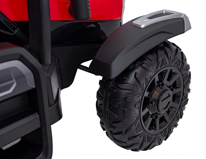 Traktor mit Anhänger rot