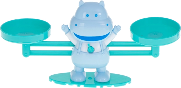 Verspielte Balancewaage mit Nilpferd