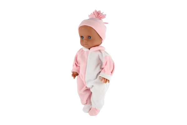 Süßes Hamiro-Baby mit festem Körper, weiß-rosa Overall und rosa Mütze