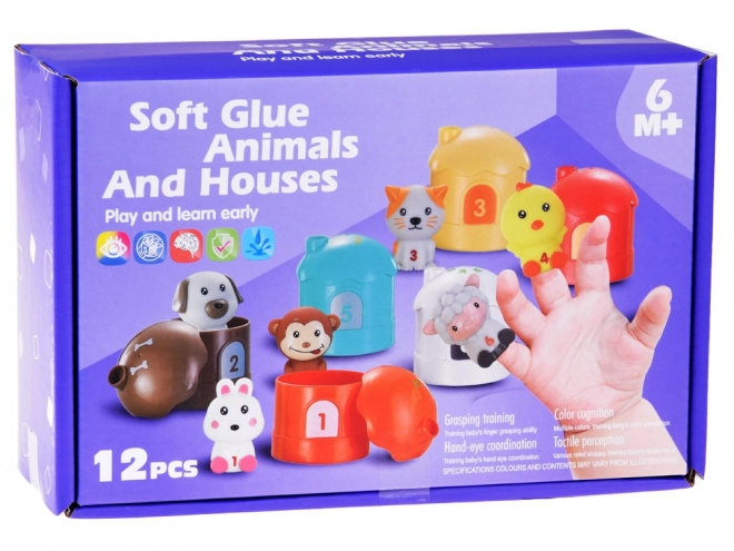 Set aus Tiergummis mit Häuschen und Zahlen