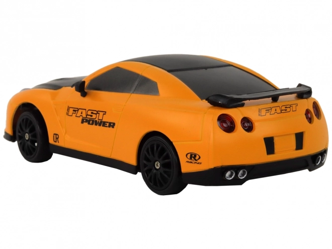Ferngesteuerter Sportwagen R/C 1:24 mit austauschbaren Rädern – Gelb