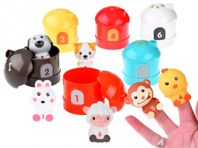 Set aus Tiergummis mit Häuschen und Zahlen