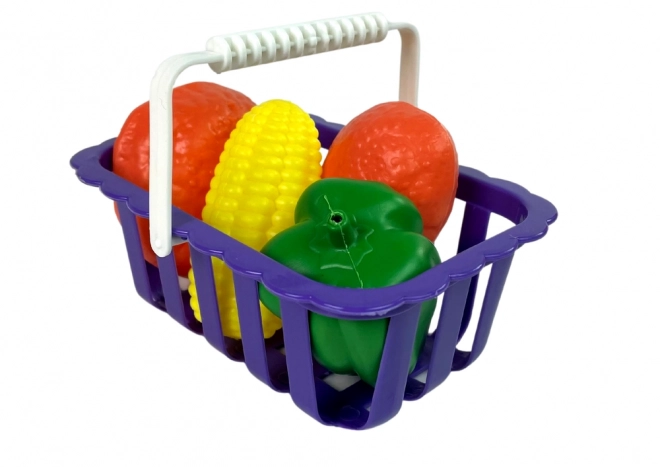 Kinderkasse mit Taschenrechner und Gemüsekorb