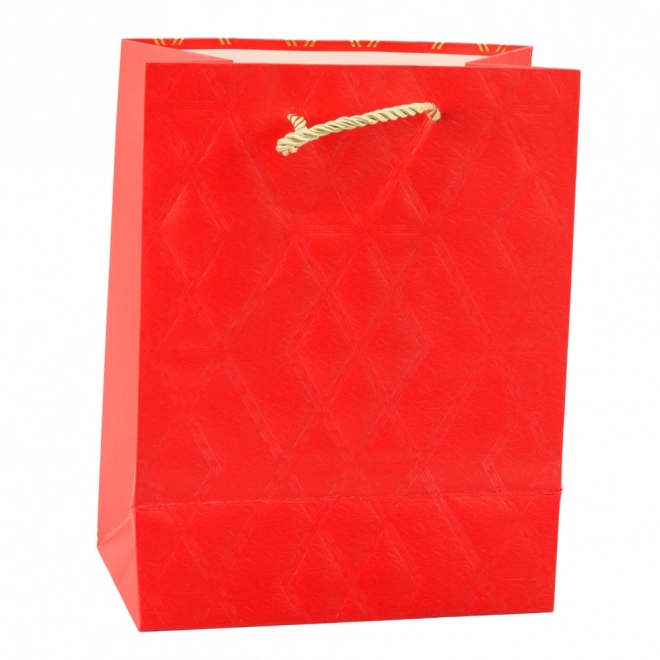 Papiergeschenktasche mit goldenen Mustern
