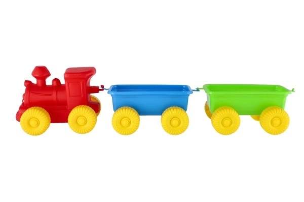 Plastikspielzeugzug mit 2 Waggons