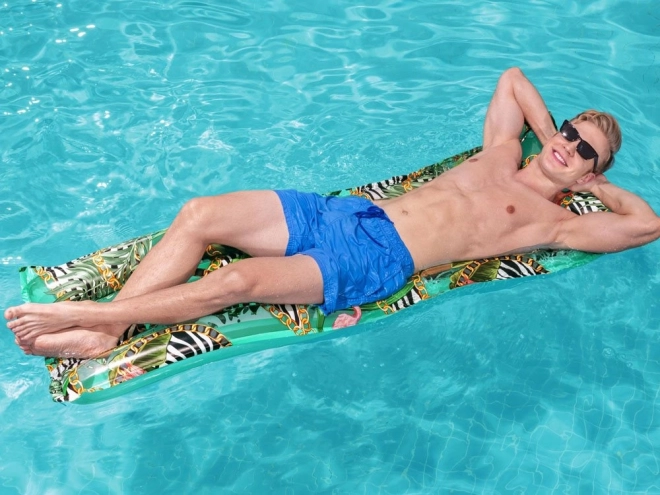 Aufblasbare Matratze zum Schwimmen mit tropischem Motiv