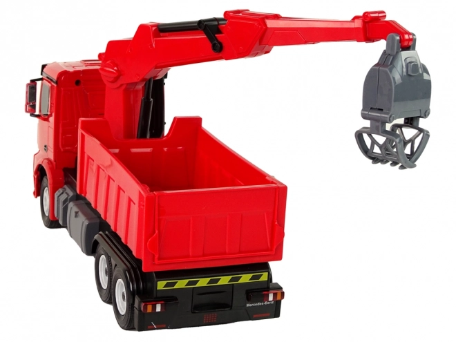Rote Mercedes Rastar Greifarm-LKW