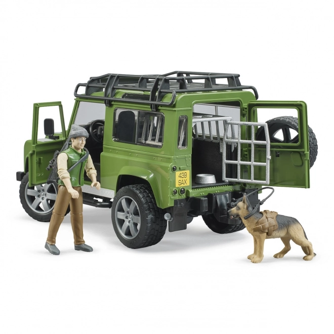 Bruder Land Rover Defender mit Jägerfigur, Hund und Zubehör